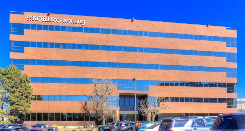 Brick office building with KORE co-working sign